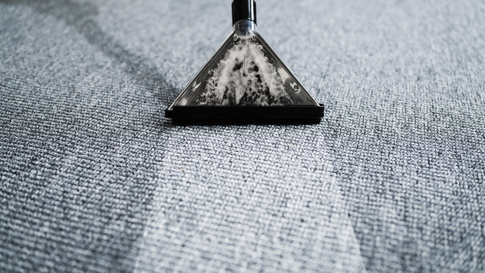 A black and white photo of a triangle shaped object